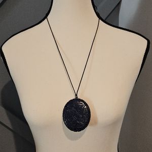 Vintage blue faux cinnabar pendant with leather cord